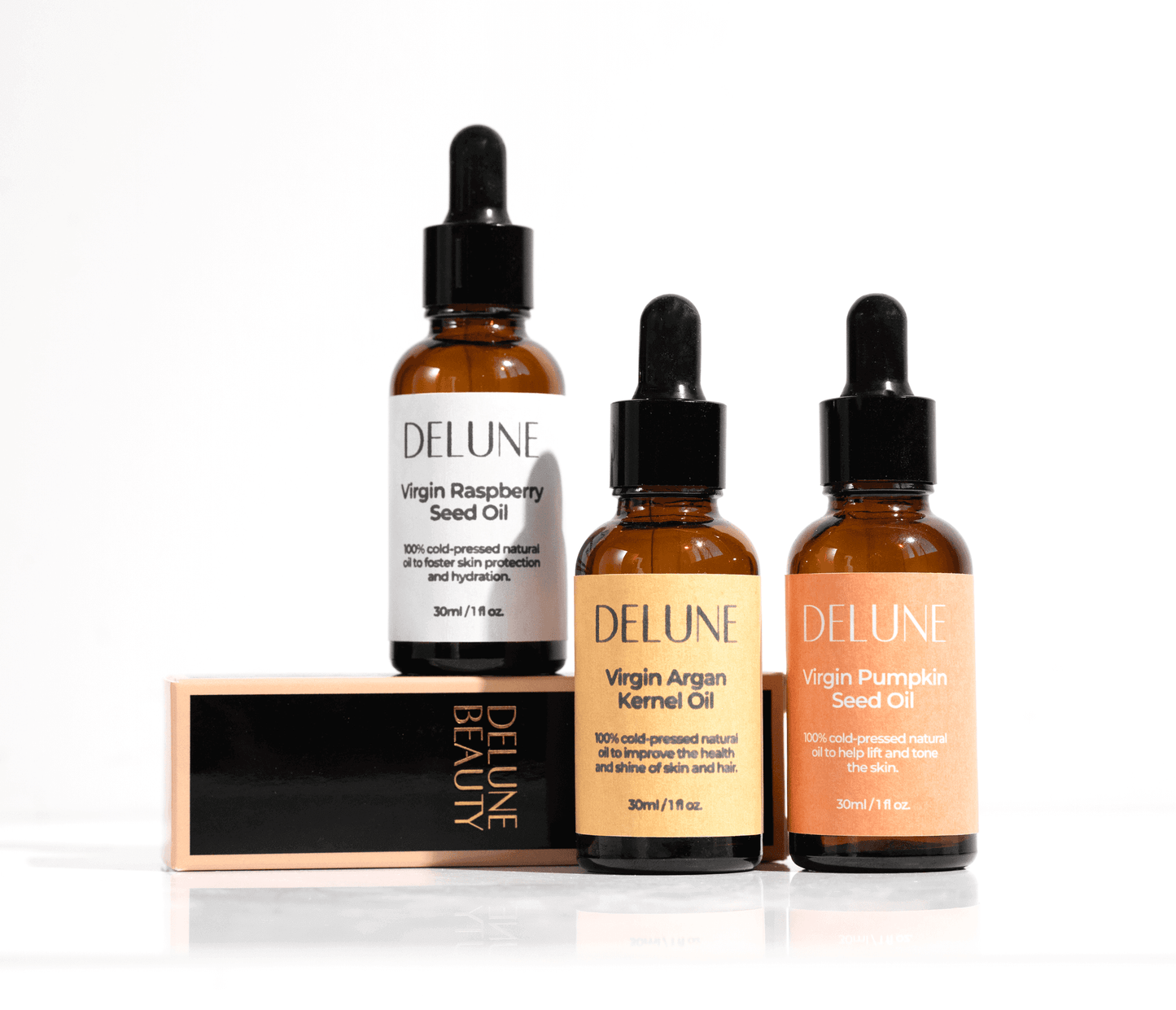 Delune Virgin Raspberry, Argan, and Pumpkin Seed Oils for skin hydration and protection, featuring cold-pressed natural ingredients.