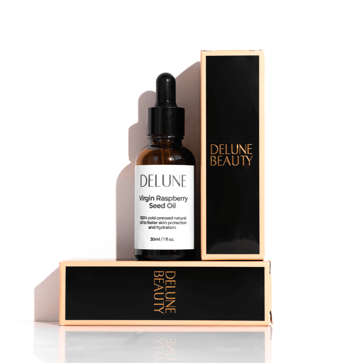 Delune Virgin Raspberry Seed Oil bottle and packaging, 30ml, for skin protection and hydration with Omega 3 and 6 fatty acids.