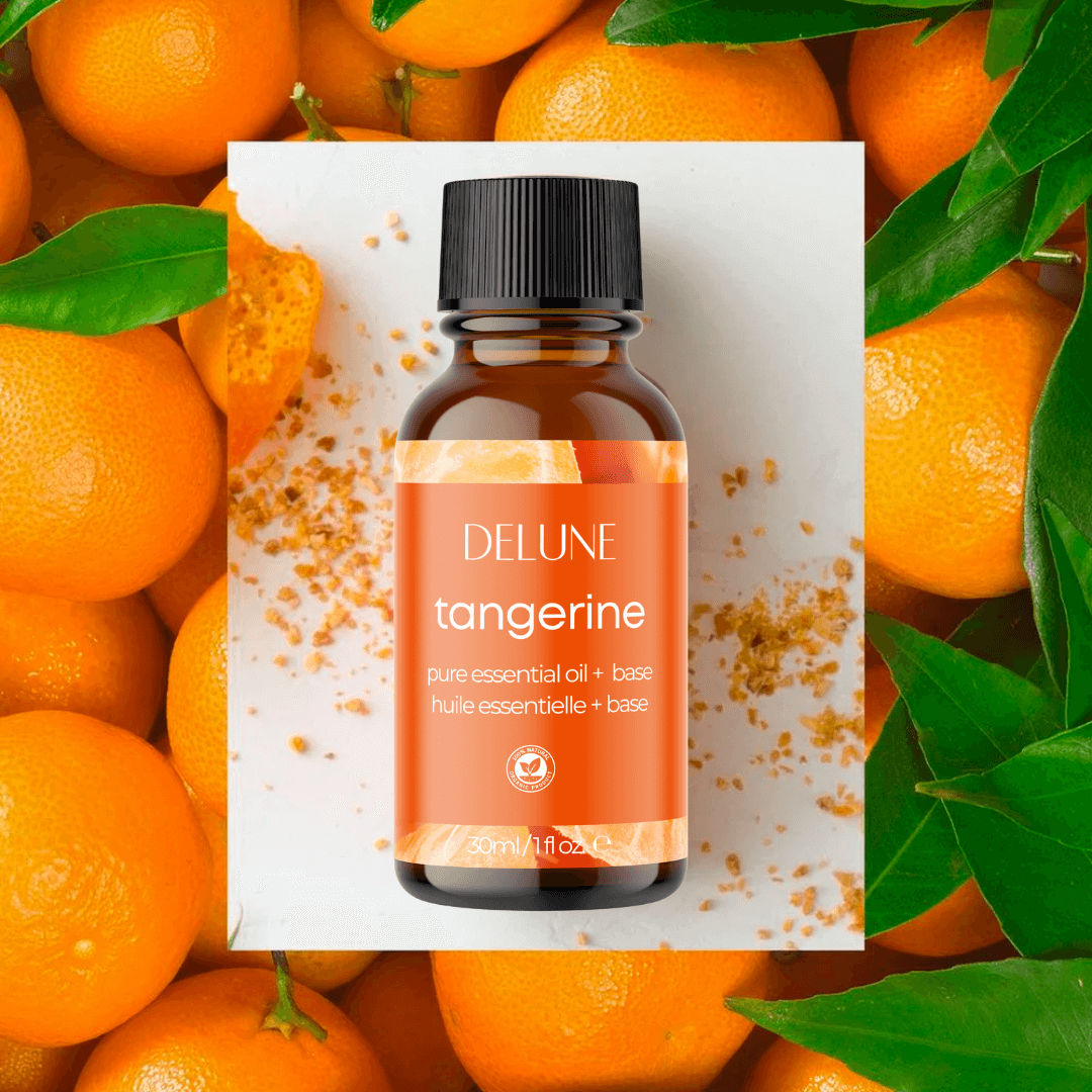 Tangerine essential oil bottle with fresh tangerines, offering a sweet and citrusy aroma for a rejuvenating bath experience.