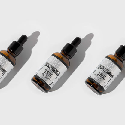 Delune's Niacinamide and 1% Zinc Serum bottles for blemish-free, balanced skin.