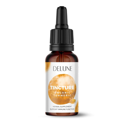Organic Turmeric Herbal Tincture bottle promoting wellness and vitality with Ayurvedic benefits and spicy aroma.