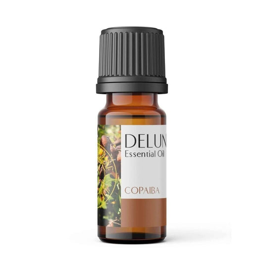 Copaiba pure essential oil bottle with calming and grounding aromas for diffusers and massage. Earthy and sweet scent.