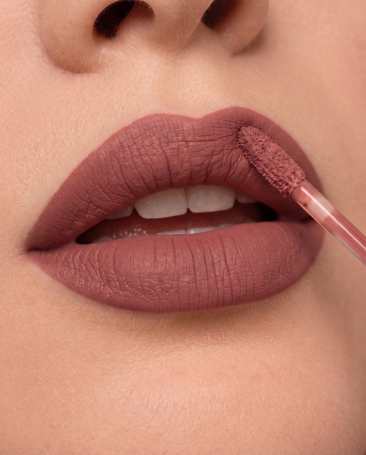 LuxMatte 24-Hour Lipstick in Date in Dubai on lips