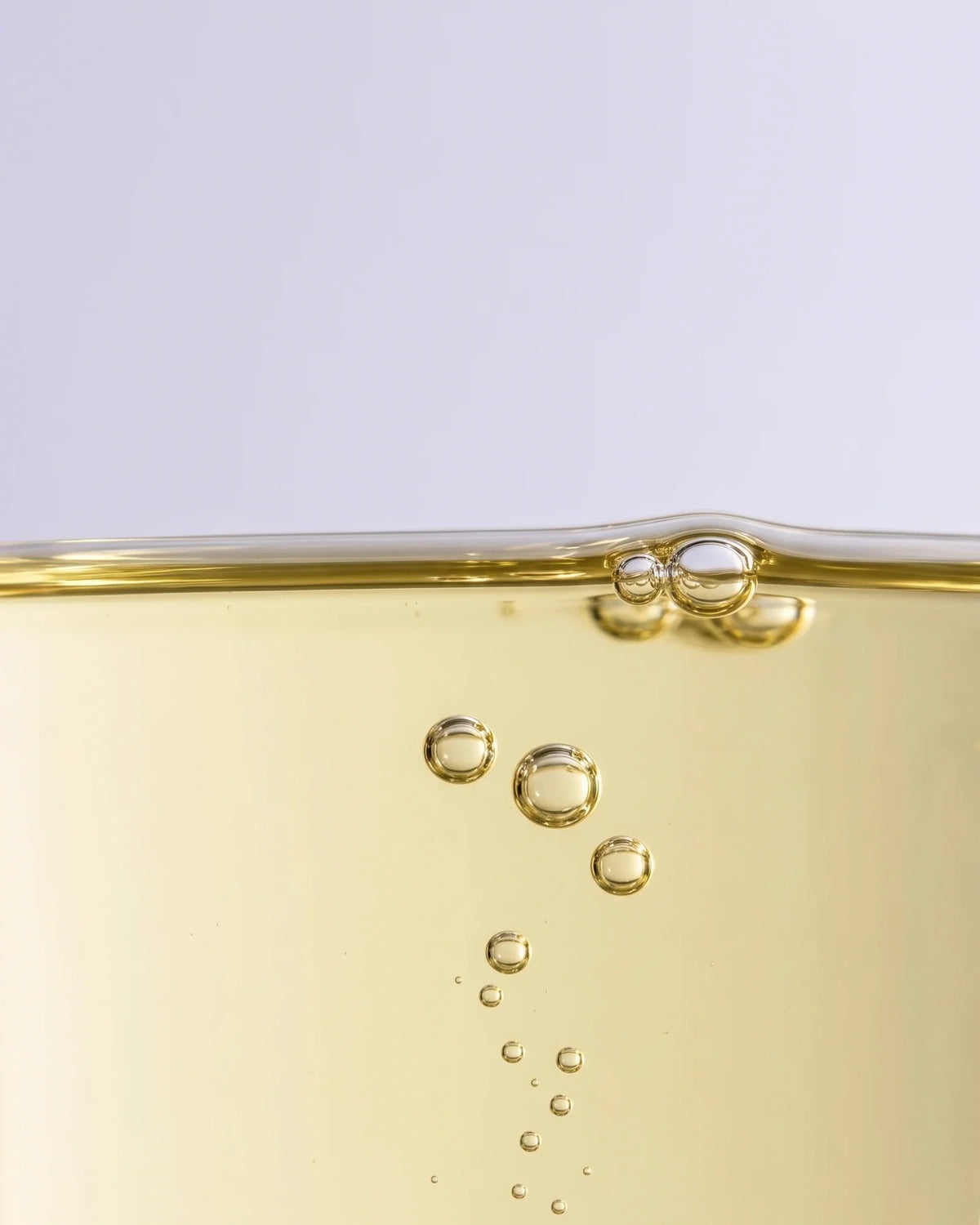 Calm 49% Marula Oil Serum texture: clear pale golden marula oil with gently rising bubbles