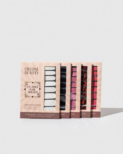 French Manicure (Part Transparent) (Non-UV Nail Wraps): row of Delune Beauty UV-free nail wrap packs standing upright