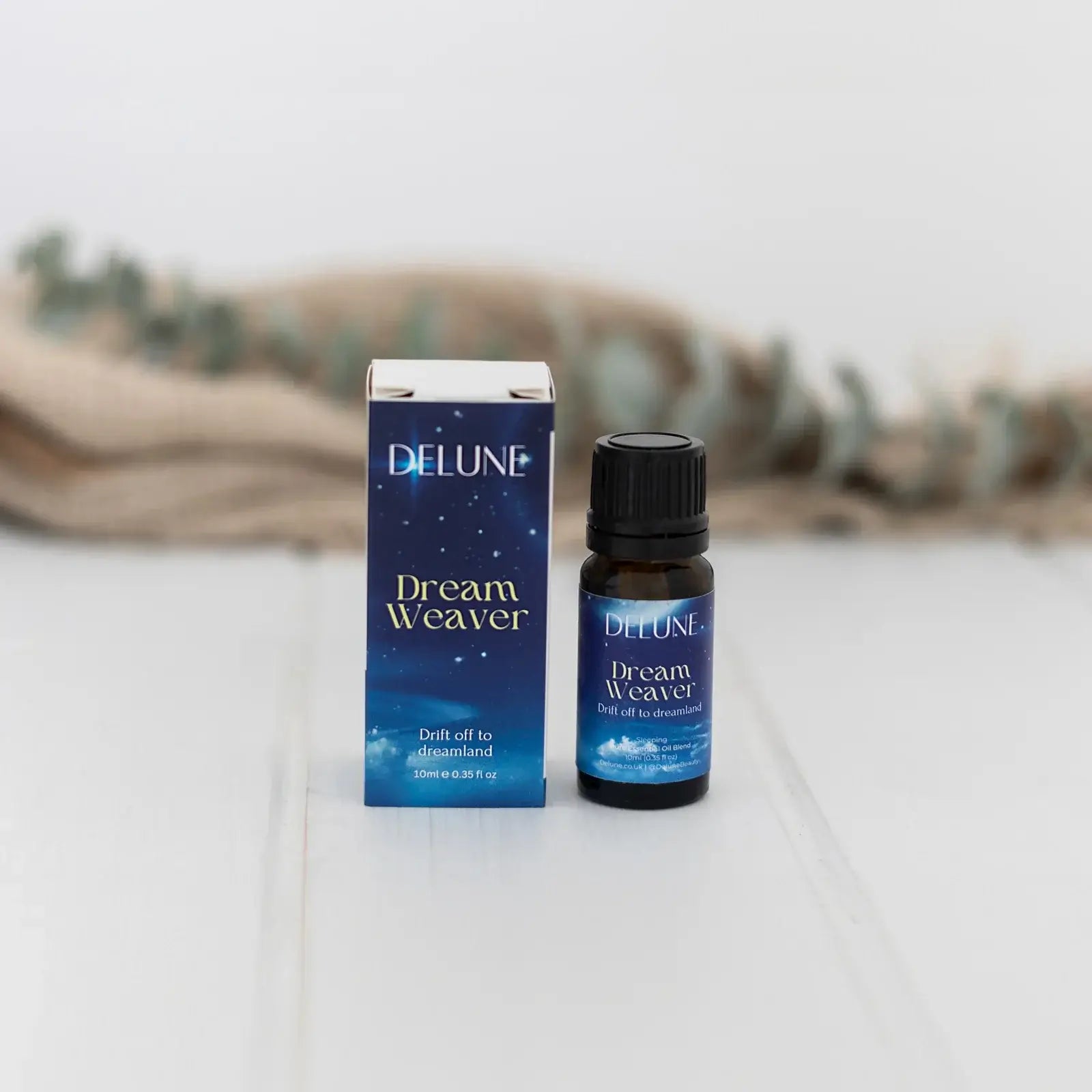Dream Weaver essential oil blend promoting sleep and wellbeing with lavender, chamomile, and ylang-ylang. Relaxation and tranquility.